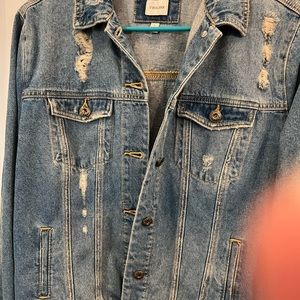 Distressed look . Never worn . Took off tags prematurely. Super fun and cute